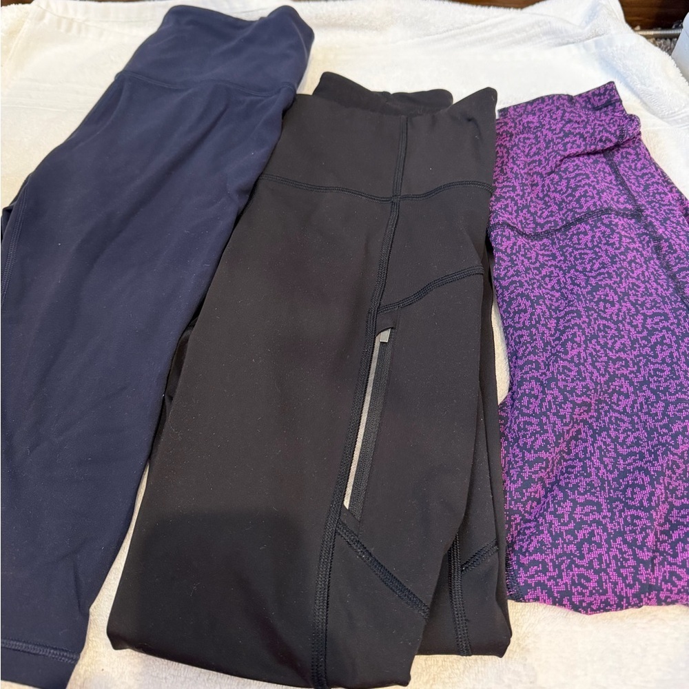Lot of 3 small Athleta leggings size small 2 are 7/8 and 1 is crop